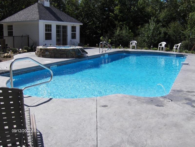 Swimming pool and stamped concrete project example 165